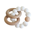 Beechwood and white silicone teether ring set displayed on a white background.