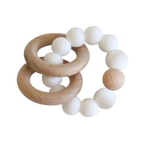 Beechwood and white silicone teether ring set displayed on a white background.